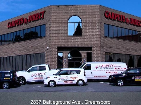 STORE FRONT WITH CARS