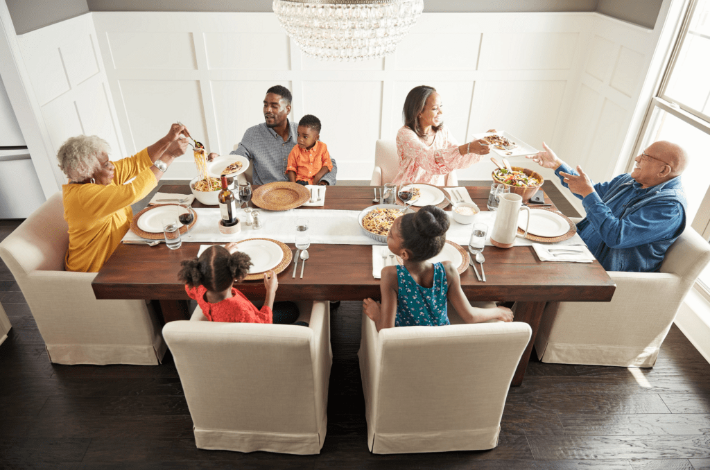 Family having breakfast at the dining table | Carpets by Direct